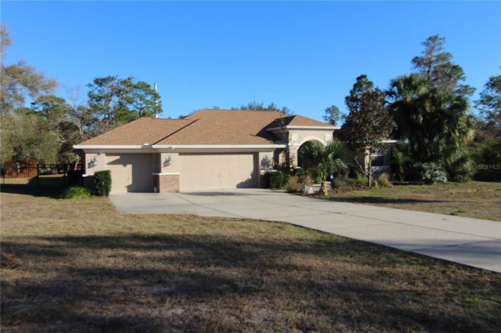 Photo of 8476 Madrid Road, Weeki Wachee, FL 34613 (MLS # O6369630)