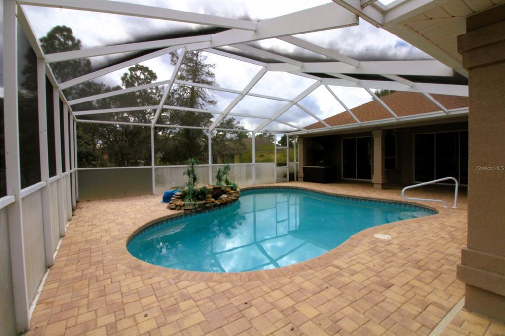 Photo of 8476 Madrid Road, Weeki Wachee, FL 34613 (MLS # O6369630)