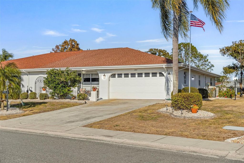 Photo of 1207 Bluewater Drive, Sun City Center, FL 33573 (MLS # TB8470244)