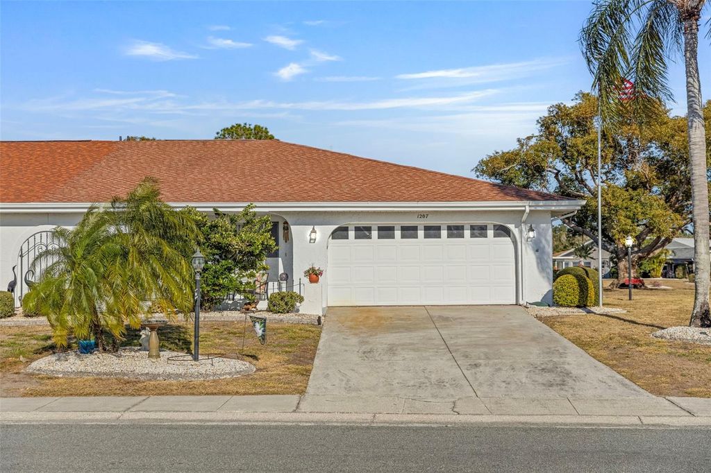 Photo of 1207 Bluewater Drive, Sun City Center, FL 33573 (MLS # TB8470244)