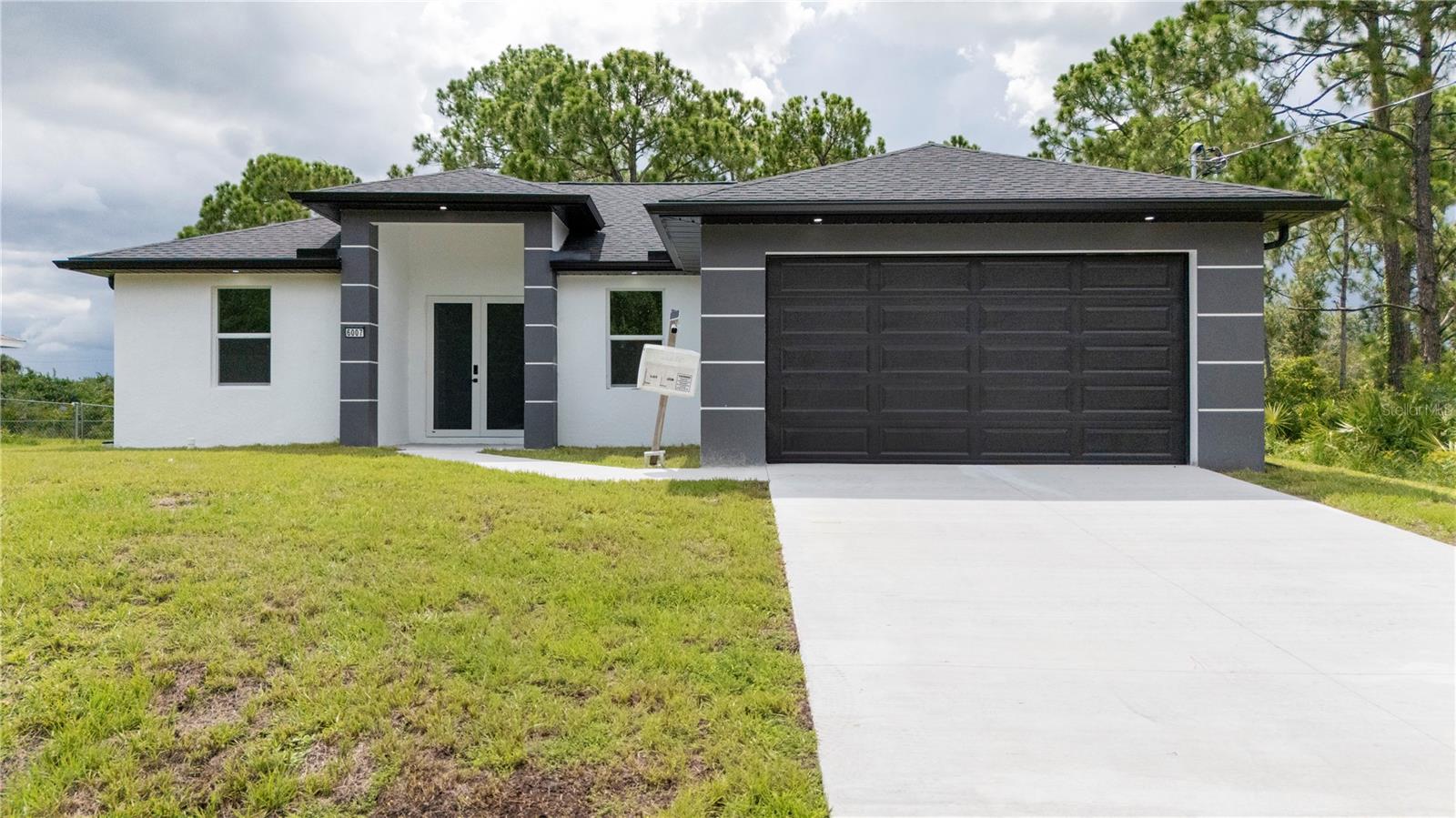 Modern, Bright, and Ready to Welcome New Stories
In the heart of Lehigh Acres, this new construction offers more than just a house—it offers a lifestyle. From the moment you step through the front door, you’ll feel a sense of space, harmony, and thoughtful design in every corner.
The open-concept layout invites connection, comfort, and ease. Whether it’s for entertaining guests or enjoying a quiet evening at home, every area flows naturally to support how you live and what you value.
At the heart of the home, the kitchen shines with personality and function: custom soft-blue cabinetry, quartz countertops, stainless steel appliances, and stylish pendant lighting. Porcelain tile flooring throughout enhances the brightness and gives the entire space a clean, modern feel.
The versatile den offers that extra flexibility so many homes lack—a perfect space for a home office, guest room, or creative studio, all without compromising style or comfort.
While appliances are not currently included, the seller is open to discussing them, allowing a unique opportunity for personalization.
Most importantly, the seller is highly motivated and open to considering serious offers, making this a standout opportunity within its category. This isn’t just about selling a house—it’s about finding the right buyer who sees the true value of what this home offers.
In short, this home delivers the perfect balance of modern design, quality finishes, and a strategic location with easy access to Fort Myers. It’s not just a real estate investment—it’s a life investment.
In short, this home delivers the perfect balance of modern design, quality finishes, and a strategic location with easy access to Fort Myers. It’s not just a real estate investment—it’s a life investment.
Contact us today for more details or to schedule a private showing.