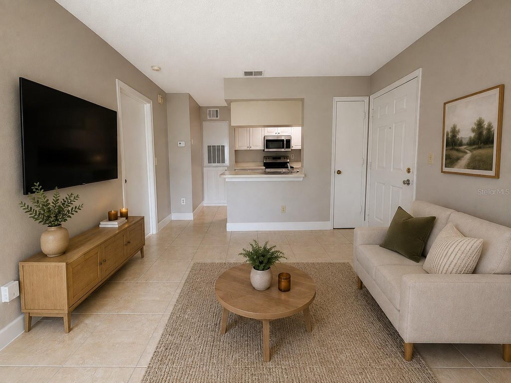 Photo of 2550 N Alafaya Trail #1101, Orlando, FL 32826 (MLS # O6429687)