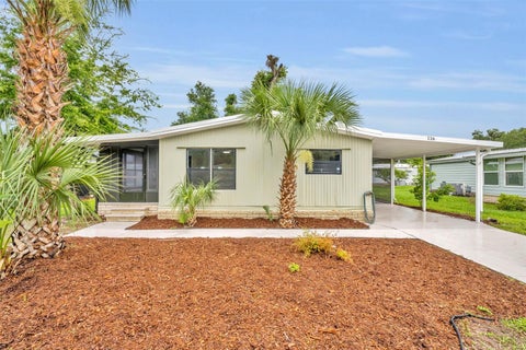 Photo of 116 Cypress Road, Wildwood, FL 34785 (MLS # G5113244)