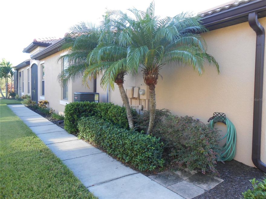 This DESIRABLE CUL DE SAC WATERFRONT Villa with GREAT VIEWS is now available! Built in 2013, this lovely 2/2 SPLIT PLAN villa features an Open Kitchen with Stainless Steel Appliances, 42" Solid Wood Cabinets, Granite Countertops, and a natural tile backsplash. Take a step through the TRIPLE SLIDING GLASS DOORS onto the extra large extended SCREENED LANAI with a stunning WATER VIEW. Southshore Falls features a 24/7 guarded & gated entrance with maintenance-free grounds. Home has a New Garage Door opener installed this year, a NEW WATER HEATER in 2024 and a NEW HVAC SYSTEM installed in 2023. Check out the State of the Art RESORT STYLE  amenities, such as the 3 HEATED SWIMMING POOLS, a Hot Tub/Spa, Large Fitness Center, 14,000 square foot clubhouse with Ballroom, a Cafe, Library, Billiards Room, Crafts Room, Putting Green, Walking Trails, Bocceball, Shuffleboard, Tennis & PICKLEBALL Courts. Villa is Smoke Free and Pet Free.  You are just a short ride away from the new Walmart scheduled to open early 2026 as well as Winn Dixie, two Publix stores, medical providers, Apollo Beach Nature Preserve, Apollo Beach Park and Rec, Boat ramps, and various dining options! NO CDD!  Buyers/Buyer’s agent should verify all information with the HOA.