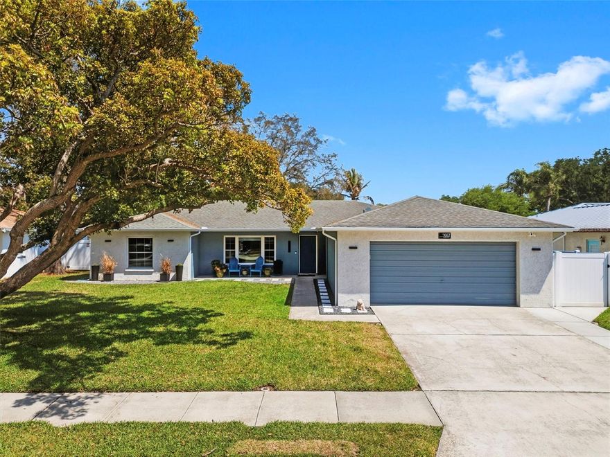 **Back on the market due to buyer's financing** Welcome to a beautifully updated 4Bedroom / 2 Bath residence on over ¼ acre, in a highly desirable neighborhood in Seminole.  Perfectly blending modern style with comfortable living, this home offers an elevated lifestyle both inside and out. 
Step inside to discover a stunning, fully renovated kitchen designed to impress. Anchored by an expansive peninsula with Espresso lower cabinets and white shaker uppers, this space is ideal for entertaining, casual dining, or gathering with family and friends. Calcutta quartz countertops with a touch of gold, contemporary cabinetry, and a seamless flow into the main living areas create a clean, sophisticated aesthetic. Enjoy on-demand hot water and filtered water with a built-in Reverse Osmosis system. . Just across from the kitchen, a thoughtfully designed bar area showcases designer tile accents—perfect for serving cocktails or creating a stylish coffee station.
Throughout the home, you’ll find luxury vinyl flooring that runs continuously with no transitions, delivering both durability and a polished, cohesive look. Natural light pours in through newer windows, enhancing the open feel and highlighting the home’s modern finishes.  You’ll love the newly updated indoor laundry, with lots of storage and quartz counters and large utility sink.
The outdoor living space is equally impressive and designed for true Florida living. A large pool area is complemented by an expansive deck, offering plenty of room for lounging, dining, and entertaining. Whether hosting weekend gatherings or enjoying a quiet evening, the backyard provides exceptional privacy and usability. With a combination of screened-in and open-air spaces, you can enjoy the outdoors year-round in comfort and style.  The yard was sodded in 2025 and updated with low-maintenance modern landscaping.  The front of the home has crushed-shell accents and modern outdoor lighting, giving the home a ton of curb appeal.
Additional features include an oversized garage with ample storage space, ideal for larger vehicles, recreational equipment, or a workshop setup. The generous lot size further enhances the home’s appeal, providing a rare combination of space and flexibility.
Located in a highly desirable area of Pinellas County, this property offers convenient access to top-rated schools, beautiful Gulf beaches, parks, shopping, and dining. At nearly 70’ above sea level, flooding is not a concern!  Walsingham Park and the Pinellas Trail are just a few blocks away.
This is more than just a home—it’s a refined retreat where thoughtful upgrades and inviting spaces come together to create something truly special.