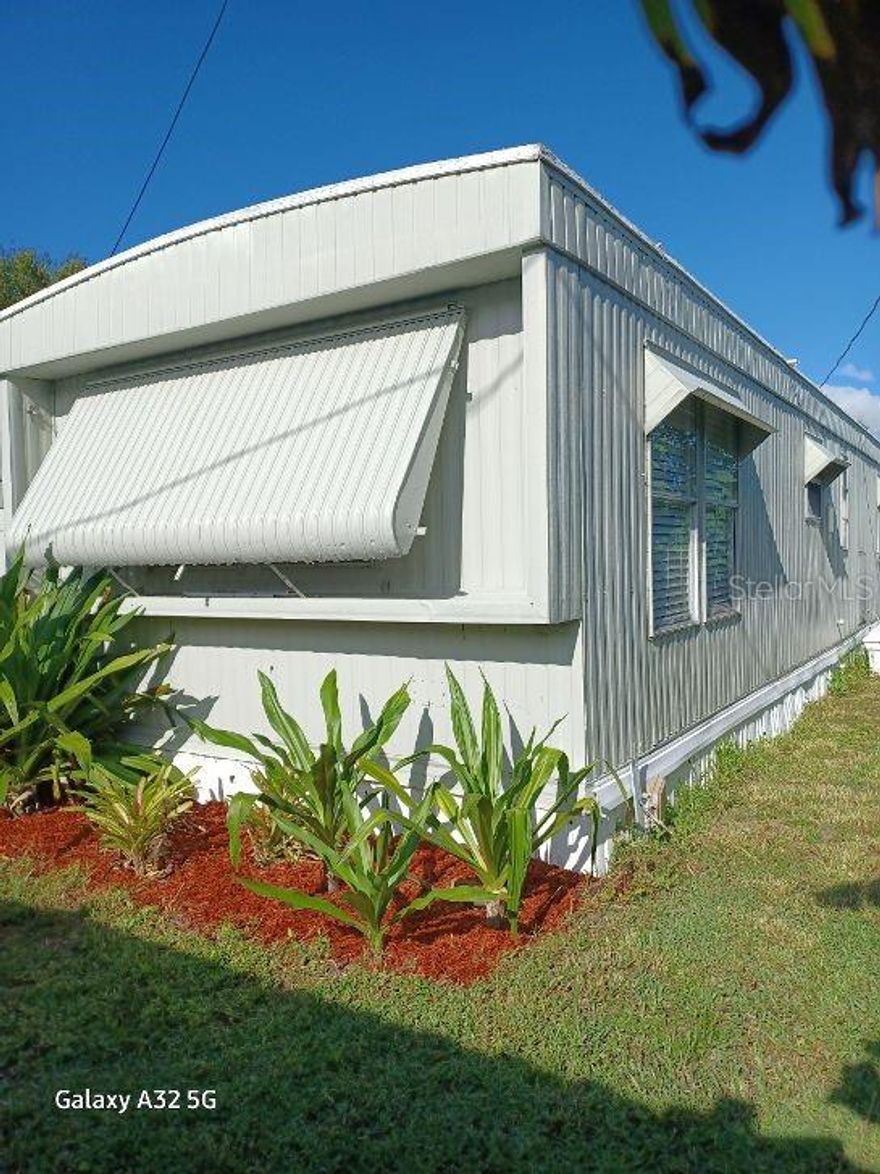 This home has many possibilities.  There is a one-bedroom mobile home and CBS dwelling with office, bath, kitchenette, garage and a large concrete pad.  There is a 12 X 12 CBS utility room which has the washer and dryer and storage.  Just think of the possibilities.  This property is located near Kanner Hwy. as well as access to interstate 95 and in a few years close to the new international airport.