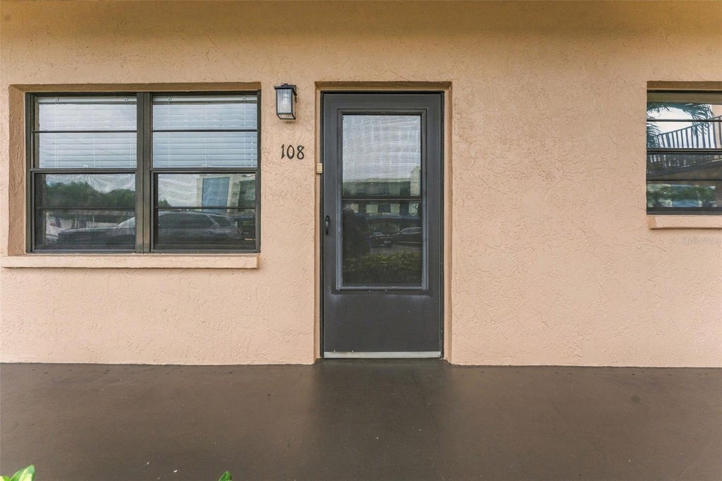 Photo of 5971 Terrace Park Drive N #108, St Petersburg, FL 33709 (MLS # TB8552015)
