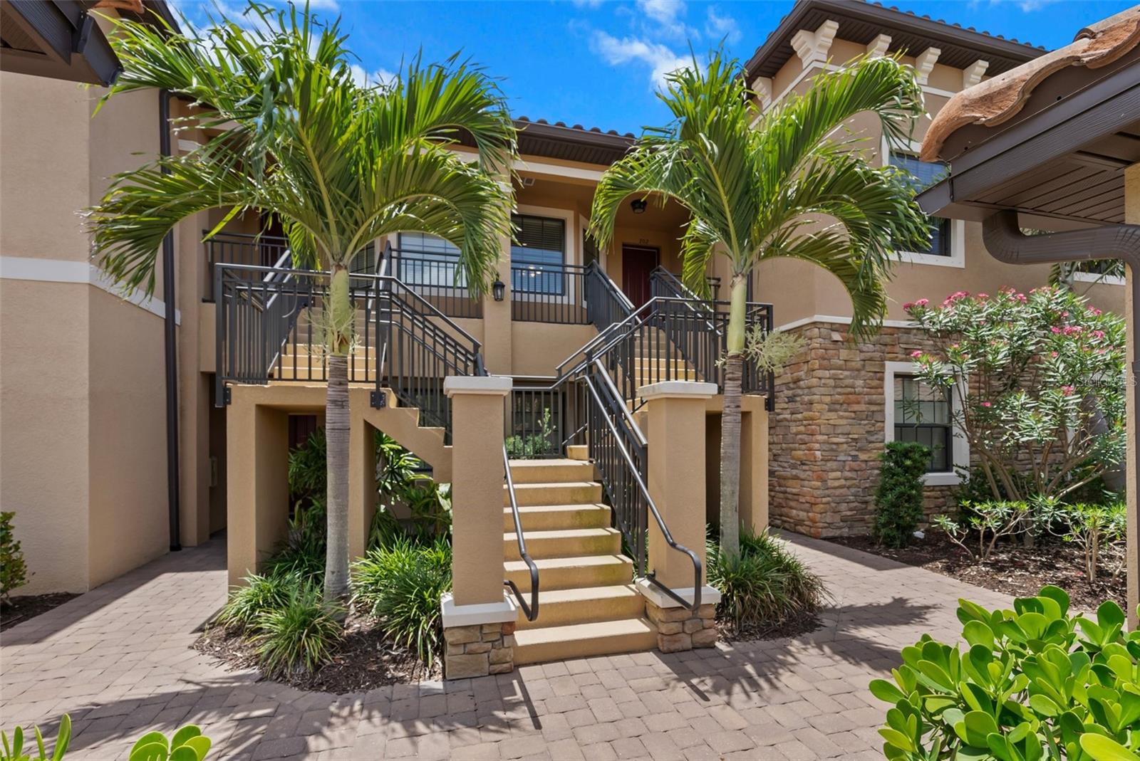 Experience refined living in this elegant second-floor residence at 13810 Messina Loop, Unit #202, situated within the esteemed Esplanade Lakewood Ranch community. This polished 2-bedroom, 2-bathroom home, complete with an additional flexible space ideal for a home office or guest quarters, showcases picturesque golf course vistas from an elevated vantage point and comes TURNKEY ready for you to move right in.
Step inside to discover a thoughtfully designed, open-concept layout graced by high ceilings and abundant natural light. The gourmet kitchen is a chef’s delight, boasting granite countertops, modern cabinetry, stainless steel appliances, and a charming breakfast nook perfect for leisurely mornings. The spacious living area seamlessly extends onto a screened lanai, providing serene views of lush fairways and pristine landscapes.
Both bedrooms mirror tranquil retreats, with the primary suite featuring large windows overlooking the greens and blue Florida skies, an elegant en-suite bathroom for ultimate comfort. The versatile flex space presents endless opportunities to suit your lifestyle, whether as a den, office, or guest room.
Residents of Esplanade Lakewood Ranch enjoy an unmatched resort-style experience with exceptional amenities, including championship golf, tennis courts, a lavish clubhouse, a full-service spa, fitness center, swimming pools, and vibrant social events catering to every interest. Indulge in the perfect blend of leisure and luxury, making this property not merely a home but an exquisite lifestyle.