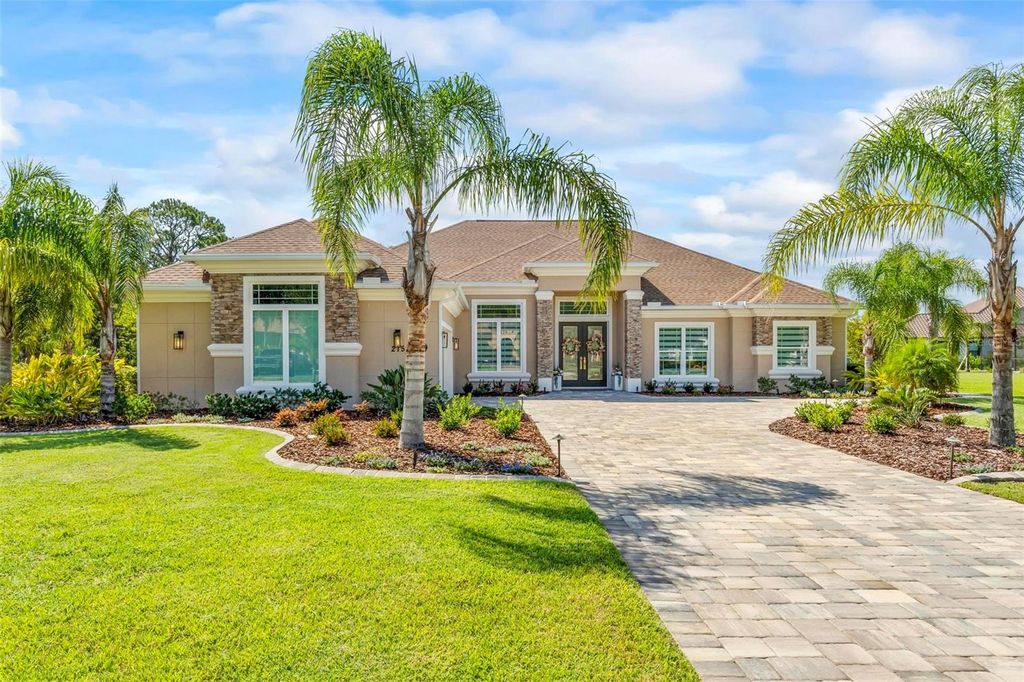 Photo of 215 Willow Oak Way, Palm Coast, FL 32137 (MLS # FC311603)