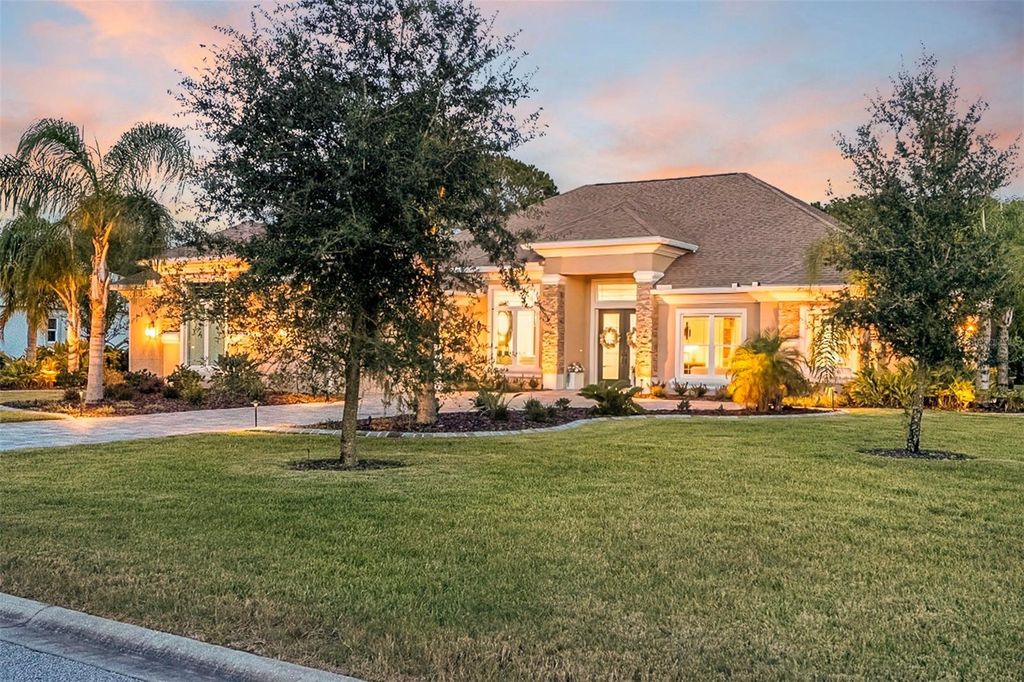 Photo of 215 Willow Oak Way, Palm Coast, FL 32137 (MLS # FC311603)