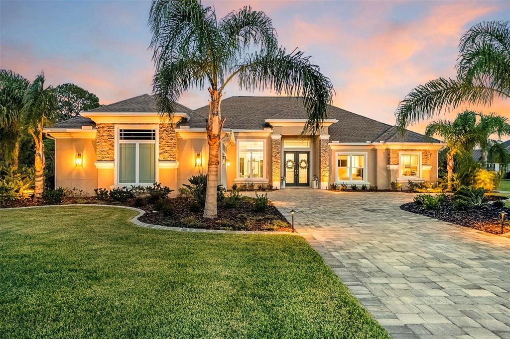 Photo of 215 Willow Oak Way, Palm Coast, FL 32137 (MLS # FC311603)