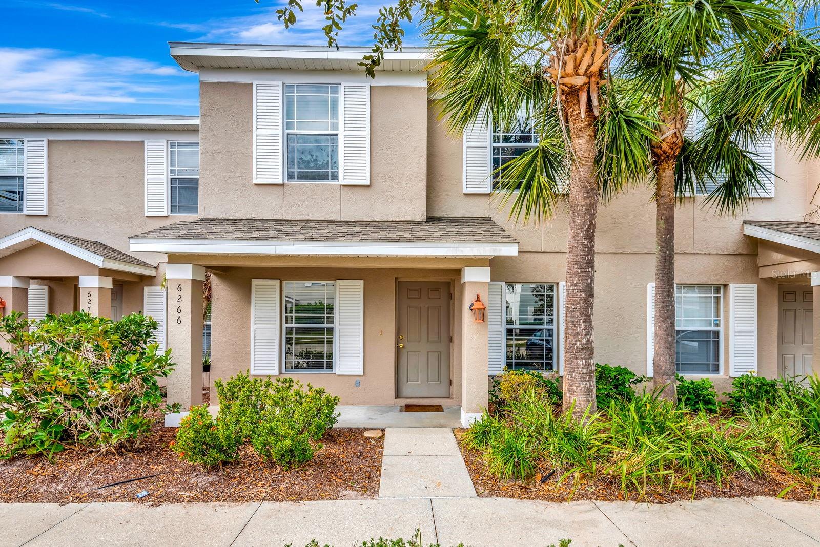 This is the ONE, where you'll double your fun, down on Triple Tail! Check out this centrally located , 2-story town home located in Lakewood Ranch. Lots of love was put into this place until the owner had to move out. Inside you will find brand new carpeting & freshly painted interior. The townhome consists of ceramic-tile floored downstairs, including living, dining, & family room areas, plus a kitchen & pantry. Don't miss the beautiful newer appliances in the kitchen which also features granite countertops with a pass through to the dining room. Upstairs you will find three spacious bedrooms, 2 bathrooms, a walk-in closet, plus washer/dryer (which will stay for the new owner). Also, there have been recent updates to the fixtures/lights. You will enjoy living in this maintenance-free community of Greenbrook Walk, within the master-planned community of Lakewood Ranch. Amenities include a heated pool, spa, basic cable, grounds maintenance, building insurance, water & garbage pick up. In addition, near by are park, playgrounds, picnic pavilion, & soccer fields. There are two assigned parking spaces, as well as a covered, screened lanai with an attached storage area. With highly rated schools, this is an excellent location, close to Sarasota & beaches, & airport etc.. A variety of shopping & dining as well as medical facilities & recreational options are available locally. The new post office is located near by as well. Come check this out before it gets snatched up!
