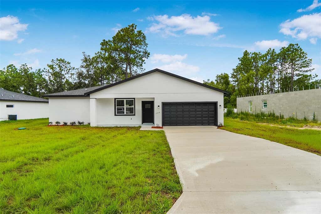 Photo of 1948 W Adelia Place, Citrus Springs, FL 34434 (MLS # O6421474)
