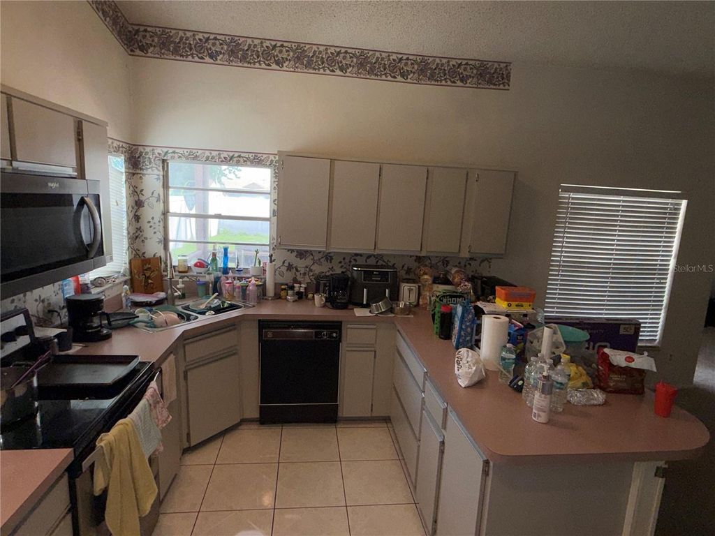 Photo of 2633 Dixie Lane, Kissimmee, FL 34744 (MLS # O6402483)