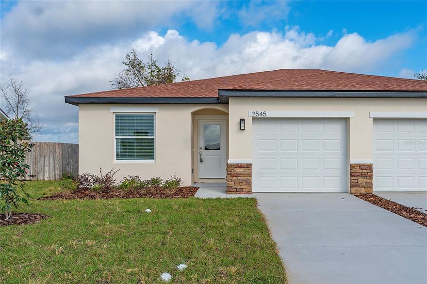 Beautiful and spacious 3-bedroom, 2-bath duplex located in the heart of Tavares! This home features an open floor plan with plenty of natural light, creating a warm and inviting atmosphere. The kitchen offers ample counter space and cabinetry, flowing seamlessly into the living and dining areas — perfect for entertaining or family gatherings. The primary bedroom includes an ensuite bath for added comfort, and the 1-car garage provides convenient parking and extra storage. Enjoy a quiet neighborhood setting just minutes from downtown Tavares, Lake Dora, shopping, dining, and easy access to US-441. This move-in-ready home offers the ideal combination of comfort, convenience, and low-maintenance living!