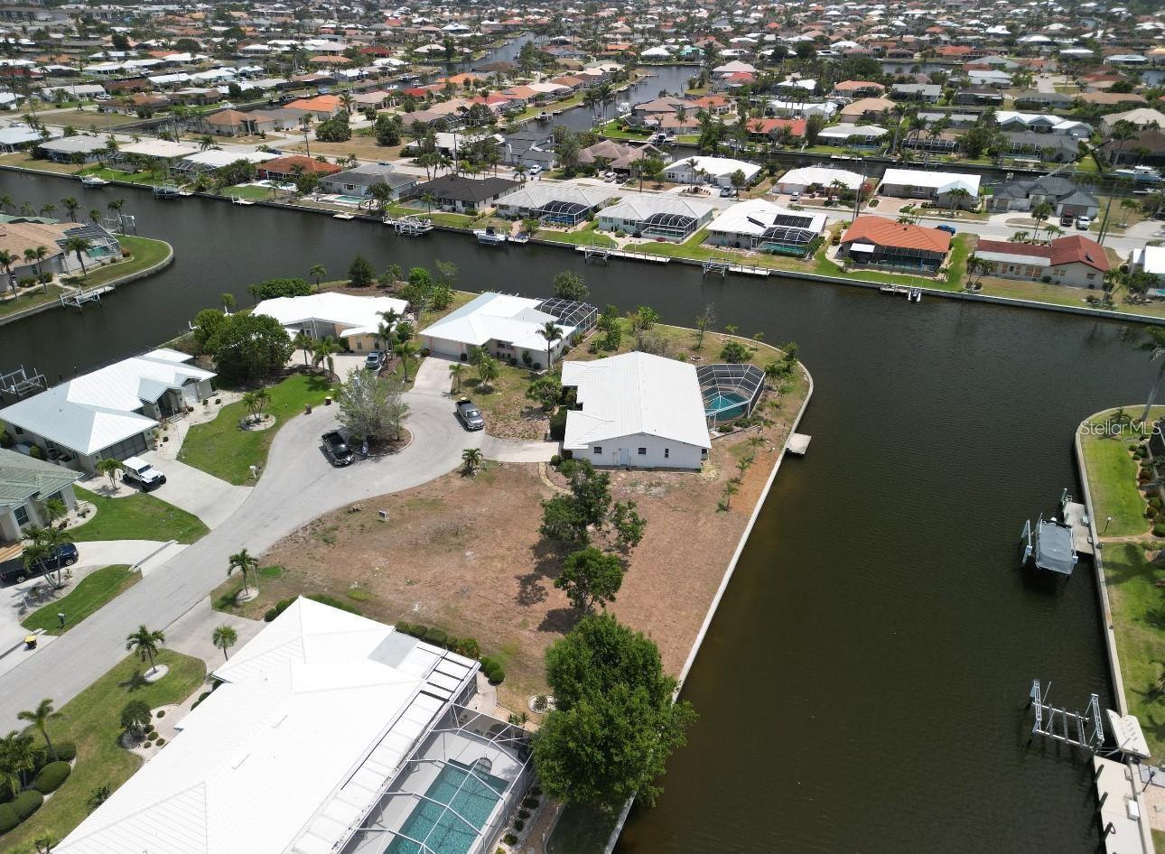 Waterfront Opportunity in Punta Gorda Isles!
This is more than just a lot — it’s your front-row seat to the best of Southwest Florida living. Located in the desirable Phase 5 of Punta Gorda Isles, this location offers true sailboat access — no bridges, no delays, just a straight shot to Charlotte Harbor and the Gulf beyond.
Set on a wide canal, the property provides the perfect canvas for your custom dock, pool, and waterfront retreat. Imagine mornings watching dolphins cruise by, afternoons on the water, and evenings just minutes away in downtown Punta Gorda, where dining, music, and waterfront parks keep the lifestyle alive.
Opportunities like this don’t last — secure your slice of paradise today and start building the waterfront home you’ve been waiting for.