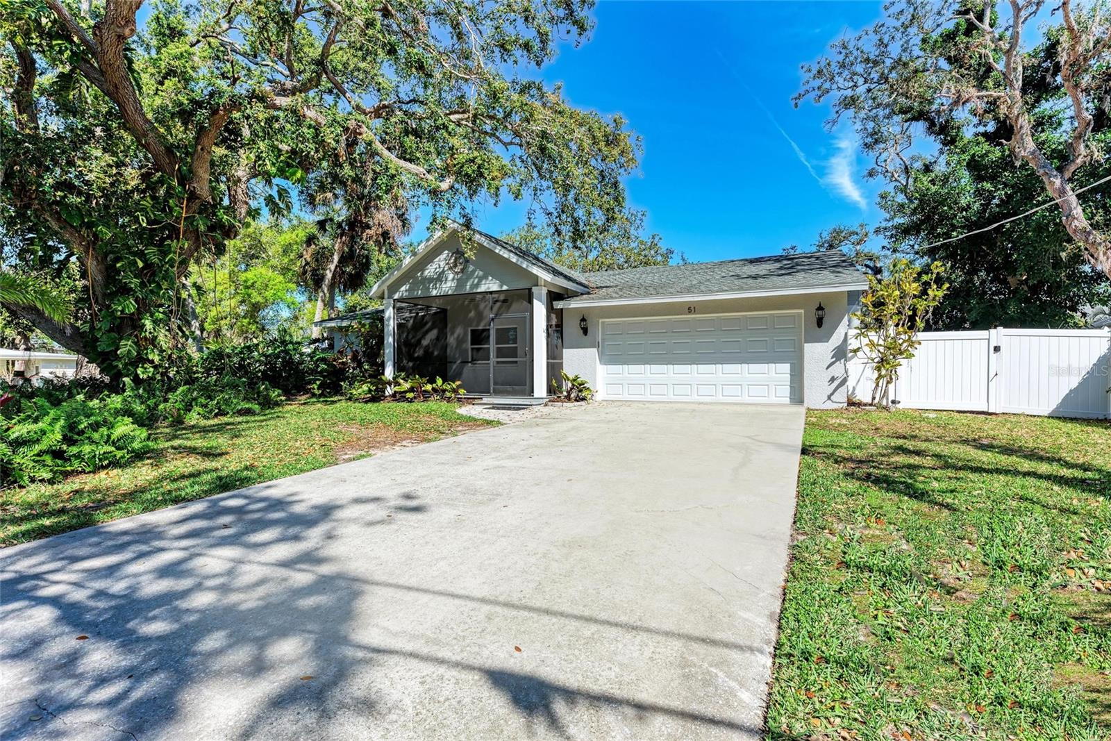 ***PRICE IMPROVEMENT***Location, Location, Location! Situated west of the trail in the heart of Osprey, this stunning 3-bedroom, 2-bathroom plus den ranch home is a rare find, just steps from Sarasota Bay. Enjoy a tranquil coastal lifestyle, with the Main Street fishing pier, Spanish Pointe Marina, Oscar Scherer State Park, and the renowned Pine View School for the Gifted close by.
Surrounded by majestic oak trees and lush tropical landscaping, this home sits on a spacious, private lot with no HOA or CDD restrictions. Inside, you'll find an open-concept design with stylish, durable flooring, an updated kitchen featuring granite countertops, solid wood cabinets, and stainless steel appliances, as well as beautifully refreshed bathrooms with high-end finishes. Move-in ready and well-maintained, this home requires no major projects—just bring your belongings and start enjoying the Florida lifestyle!
For outdoor enthusiasts, this location is unbeatable. Launch your kayak or paddleboard just down the street into Sarasota Bay, explore the nearby Bay Preserve at Osprey and Historic Spanish Point, or take a short drive to Oscar Scherer State Park, Casey Key, Nokomis Beach, and world-famous Siesta Key.
The large backyard offers plenty of space for entertaining, playing, or simply soaking in Florida’s year-round sunshine. Whether you're looking for a family home, a vacation retreat, or a profitable rental property, this home delivers it all.
Don't miss this opportunity to own a piece of paradise—schedule your private showing today!