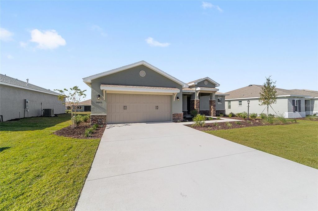 Photo of 10013 SW 106th Circle, Ocala, FL 34481 (MLS # OM715052)