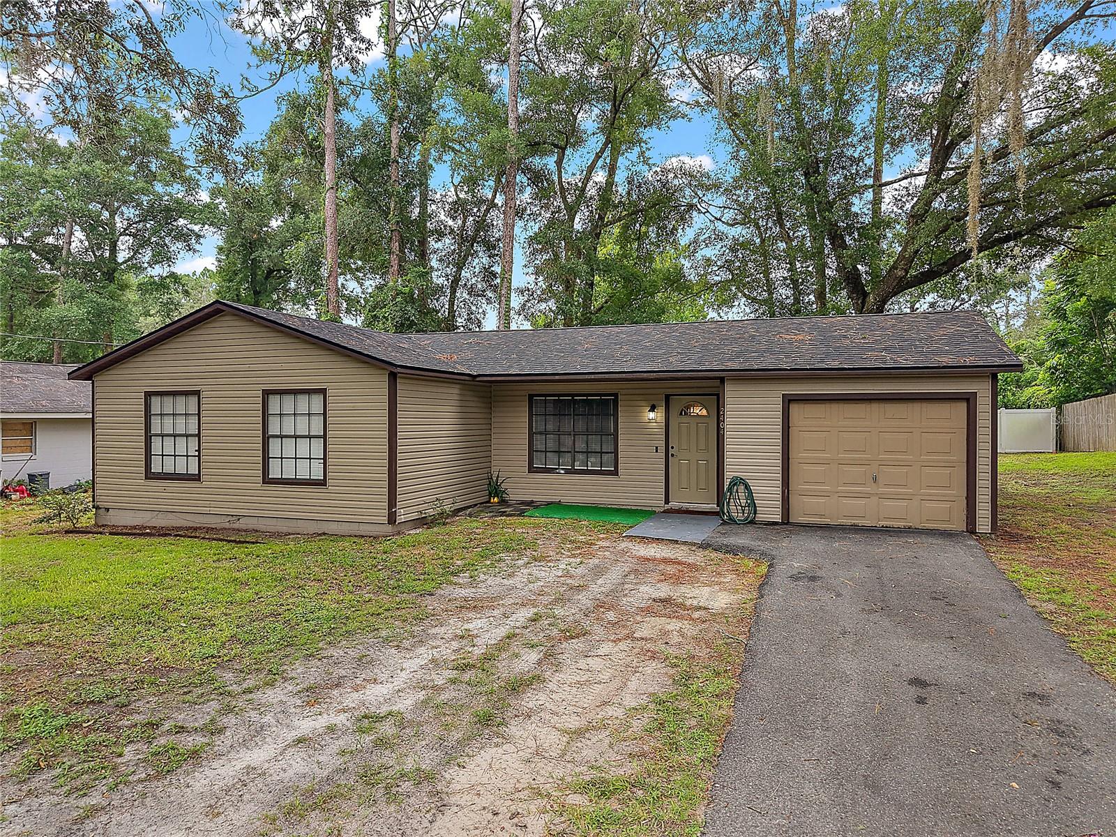 New Listing in Sun Ray Estate, Ocala, FL!
This charming 3-bedroom, 2-bathroom home with a one-car garage offers comfort, convenience, and a move-in ready experience. The home features carpeted bedrooms for cozy comfort and vinyl wood plank flooring throughout the kitchen, hallways, living, and dining areas for easy maintenance and modern style. The property has been well-maintained, with a roof less than 2 years old and all appliances included. Situated on 0.26 acres, it boasts a spacious backyard and no HOA, giving you the freedom to enjoy the space as you wish. Conveniently located near grocery stores, shopping, and downtown Ocala, with easy access to I-75, this home makes commuting a breeze to destinations like Daytona, Orlando, Gainesville, Jacksonville, and Tampa.