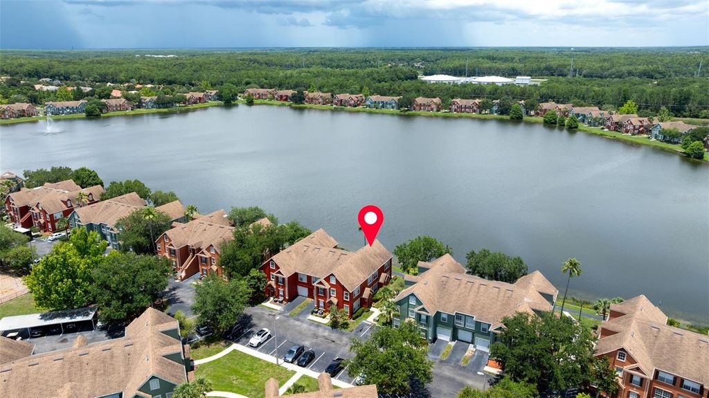 Photo of 9714 Lake Chase Island Way, Tampa, FL 33626 (MLS # TB8513981)