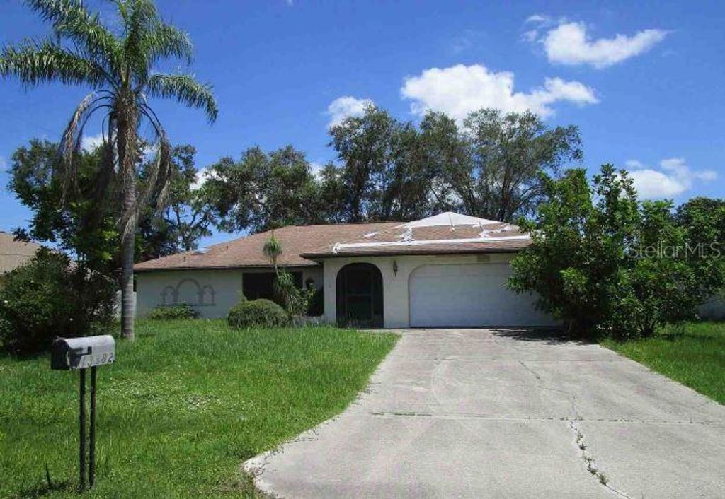 Photo of 13382 Drummond Avenue, Port Charlotte, FL 33953 (MLS # O6322470)