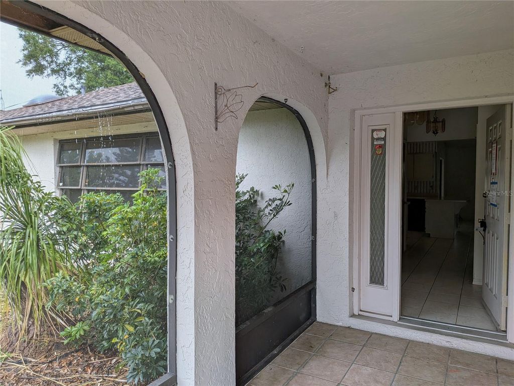 Photo of 13382 Drummond Avenue, Port Charlotte, FL 33953 (MLS # O6322470)