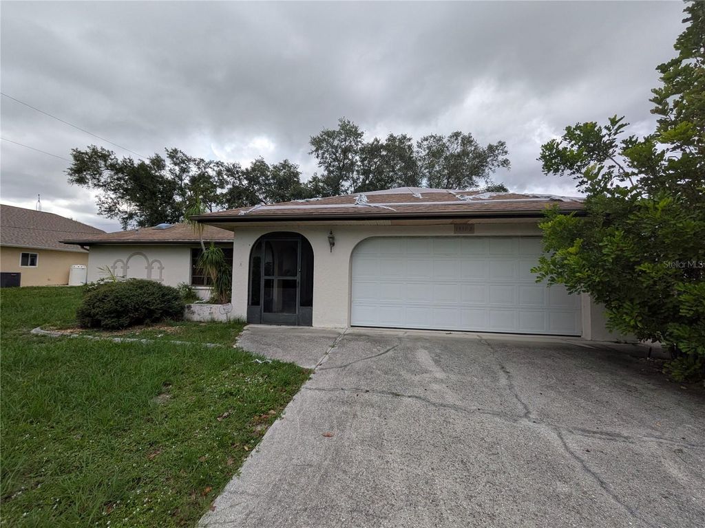 Photo of 13382 Drummond Avenue, Port Charlotte, FL 33953 (MLS # O6322470)