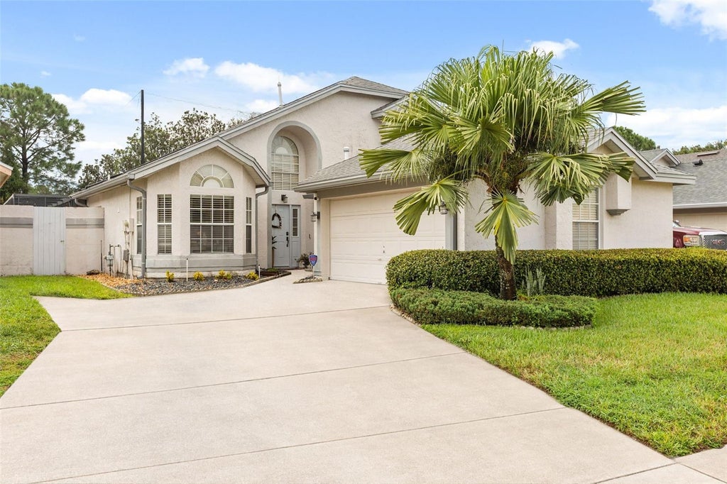 Photo of 11612 Peach Grove Lane, Orlando, FL 32821 (MLS # O6442323)