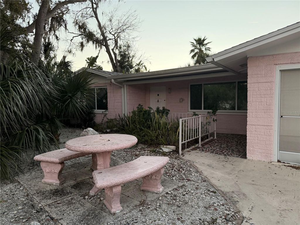 Photo of 7127 Peninsular Drive, New Port Richey, FL 34652 (MLS # TB8474594)