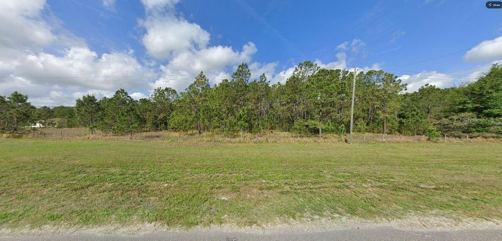 Photo of Commonwealth Ave N, Polk City, FL 33868 (MLS # O6264113)