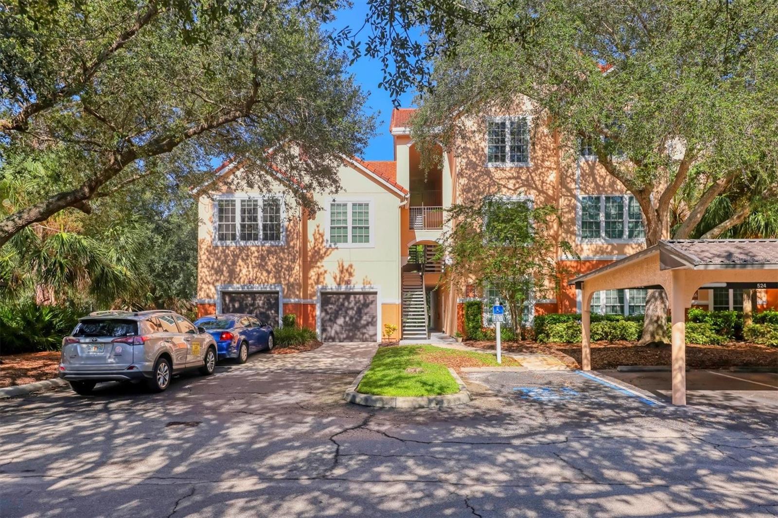 One or more photo(s) has been virtually staged. Live the Florida lifestyle at an incredible value! Welcome to Bella Villino, a gated, resort-style condominium community located in the heart of Sarasota’s highly sought-after Palmer Ranch. This beautifully designed 1-bedroom, 1-bathroom residence offers nearly 950 sq. ft. of living space, making it the largest 1-bedroom floor plan in the community.
Step inside and immediately feel the openness created by vaulted ceilings and abundant windows that fill the home with natural light. The expansive 12’ x 28’ great room offers endless possibilities—create a guest sleeping space, add a home office, or design a cozy sunroom retreat. The open layout includes a dining area, breakfast bar, and also features a separate laundry room for added convenience. As an end unit with no neighbors above or below, you’ll enjoy both peace and privacy. Below the unit is a garage (not included), and this home comes with its own dedicated covered carport plus ample guest parking.
Recent upgrades include a new AC (2023) and new water heater (2024), ensuring comfort and efficiency for years to come.
Updated Hurricane windows in every unit.
Bella Villino is known for its lush landscaping, tranquil lakes, and unmatched amenities. Residents enjoy a resort-style heated pool and spa, elegant clubhouse, state-of-the-art fitness center, indoor racquetball and basketball courts, tennis and pickleball, billiards, a business center with internet access, grilling stations, a car care area, and onsite management. The Legacy Trail is just minutes away, and world-famous Siesta Key Beach is within easy reach, along with shopping, dining, marinas, and theaters.
Now priced at $191,500, this condo is an incredible opportunity to own in one of Sarasota’s most desirable communities. Don’t miss your chance to experience the perfect combination of location, lifestyle, and value—schedule your private showing today!
