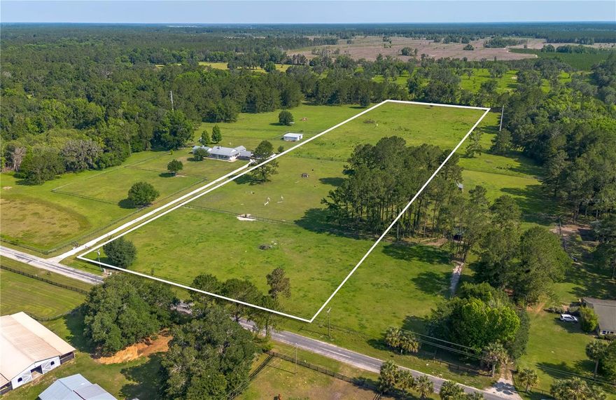 Ten acres awaiting a new parcel number– Located on a quiet country road amidst Florida’s premier horse country this 10-acre parcel is an exceptional opportunity to create your custom farm from the ground up. Established horse pastures with good ground, scattered trees, and NO flood plain provides a solid foundation for your new property. Zoned for horses and fully buildable, this high and dry acreage is cleared with gentle roll that gives flexibility to the placement of a home, barn, and pastures. For those immersed in the equestrian lifestyle, the location is unmatched. Just 15 minutes to HITS, 25 minutes to the World Equestrian Center, and 5 minutes to Sweet Dixie South, you’ll find yourself within easy reach of Central Florida’s most exciting horse venues and competitions. Daily needs are covered too with just a short drive to Williston, as well as being an easy drive to both Ocala and Gainesville. Whether you're envisioning a unique training facility or a peaceful country retreat with room to ride, this property offers the freedom and foundation to build exactly what you need on your own terms! Survey available.
