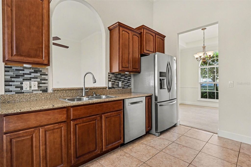 Photo of 314 Terranova Boulevard, Winter Haven, FL 33884 (MLS # O6401702)