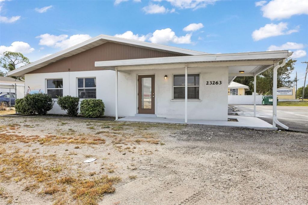 Photo of 23263 Harborview Rd, Port Charlotte, FL 33980 (MLS # C7499680)