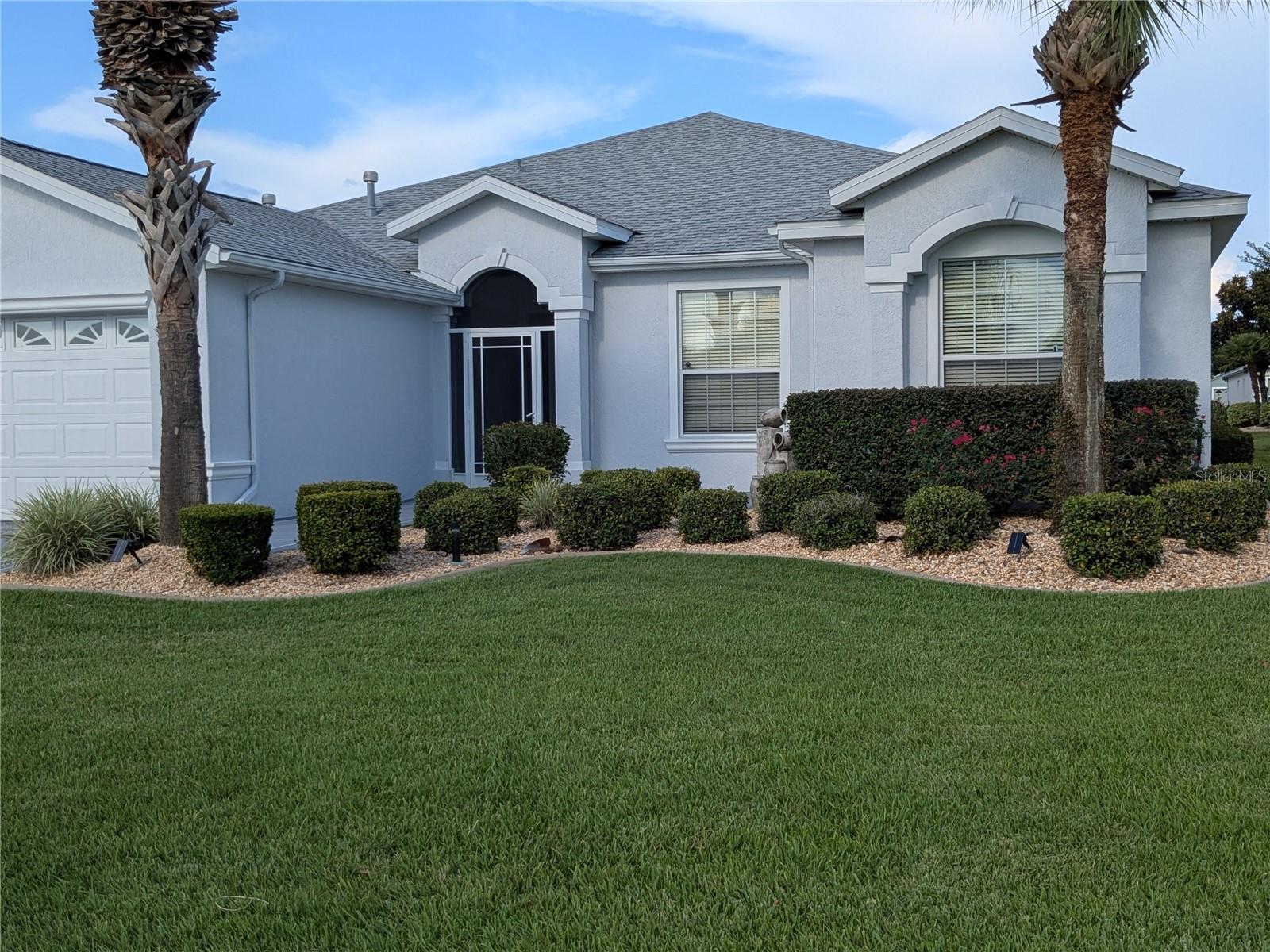 Welcome to Your Florida Oasis. Located in the highly desirable 55+ gated community of SummerGlen, this expanded Bal-Harbor model exudes elegance, comfort, and thoughtful design throughout.
From the moment you arrive, the Stone Creations driveway and sidewalk paired with lush, meticulously maintained landscaping create an inviting first impression. Step inside to discover 9'4" ceilings, rich laminate wood flooring, and an open, light-filled floorplan designed for effortless living and entertaining.
The chef’s kitchen is the heart of the home—offering dark wood cabinetry, quartz countertops, miles of counter space, and a massive center island perfect for meal prep, entertaining, or baking. A formal dining area adds an elegant touch for hosting gatherings.
Enjoy the serenity of a spacious primary suite featuring a split walk-in closet and a spa-inspired ensuite bathroom with a walk-in shower. Two additional bedrooms plus a den/flex space provide plenty of room for guests or hobbies. Closets are thoughtfully placed throughout the home for abundant storage.
Step outside and relax in your private 15x30 nearly maintenance-free, solar-heated pool with screen enclosure and covered lanai—a perfect space for both quiet mornings and lively gatherings.
Additional features include:
Oversized 2-car garage
Inside laundry room
Multiple walk-in closets
Tastefully appointed finishes throughout
SummerGlen offers resort-style living with access to an 18-hole championship golf course, clubhouse, community pool, fitness center, dog park, pickleball, tennis, basketball, and more. Enjoy peaceful walks, vibrant social life, and the tranquility of a beautifully maintained neighborhood. All just minutes from shopping, dining, medical, and highway access.
This home truly reflects pride of ownership and offers the perfect blend of luxury, functionality, and relaxation. Don’t miss your chance to call this exceptional property home!
Contact April Fulton with Bill Rodgers Realty, Inc. for your private showing today!