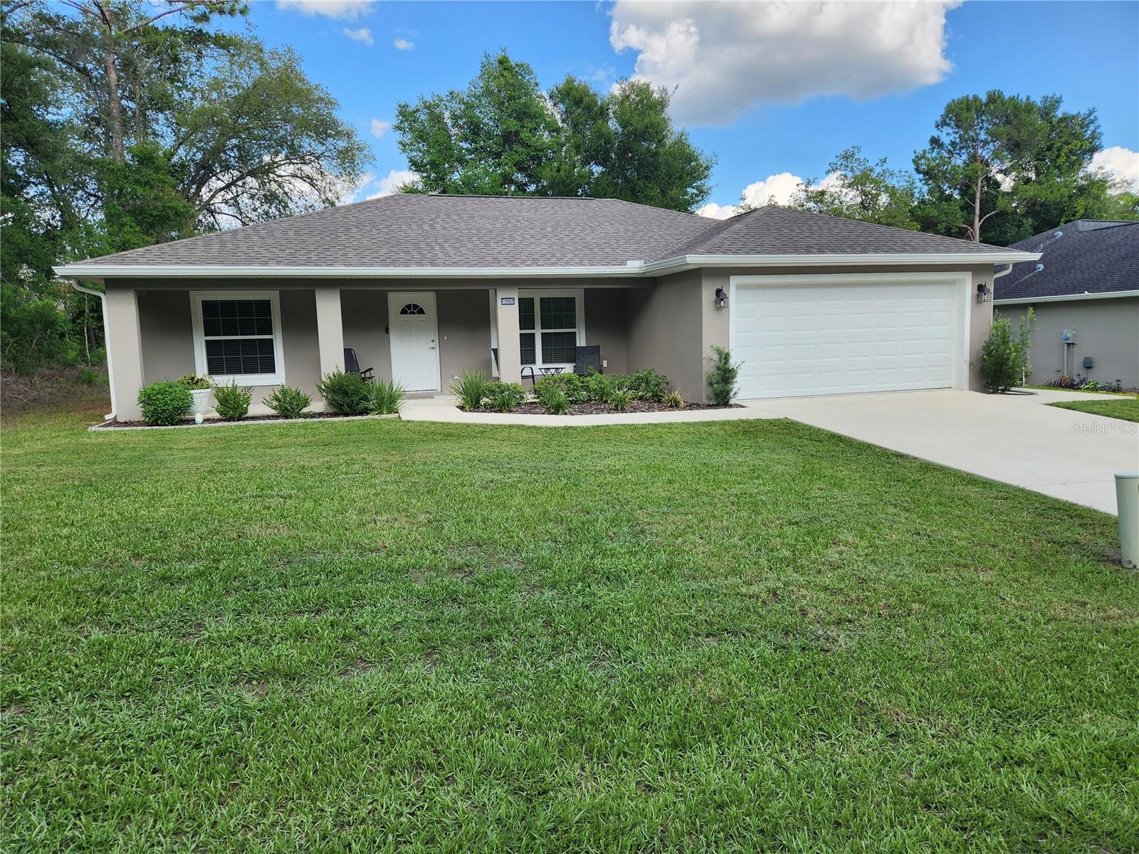 Welcome to this charming home in Summerfield, FL, featuring a spacious layout with three bedrooms and two bathrooms. The open-concept design seamlessly connects the living, dining, and kitchen areas, creating a welcoming atmosphere. Enjoy the privacy of a fenced backyard, appropriate for outdoor activities. Conveniently located near local amenities and offering easy access to major roadways, this property is a wonderful opportunity for comfortable living.
