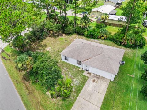 Photo of 3403 Queen Palm Drive, Edgewater, FL 32141 (MLS # O6426384)