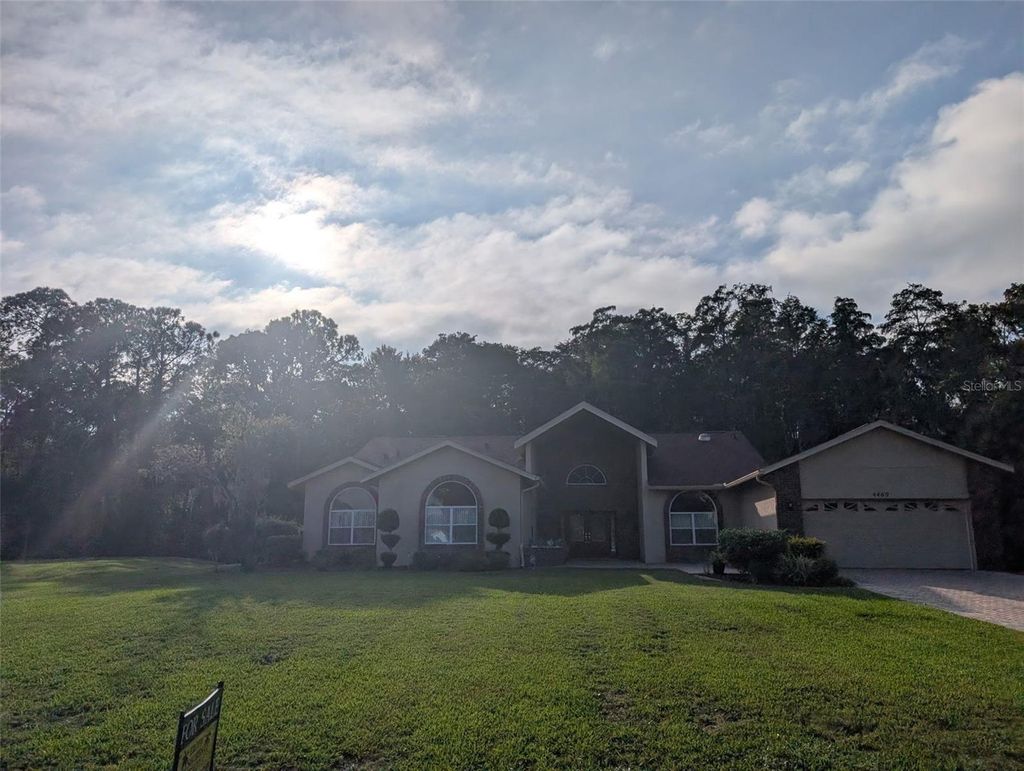 Photo of 4469 Lake In The Woods Drive, Spring Hill, FL 34607 (MLS # TB8440756)