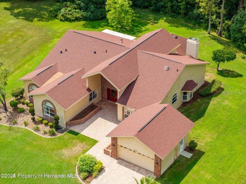 Photo of 4469 Lake In The Woods Drive, Spring Hill, FL 34607 (MLS # TB8440756)