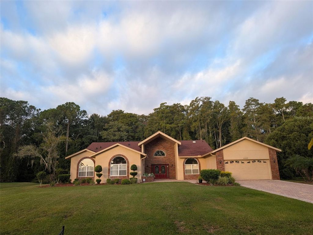 Photo of 4469 Lake In The Woods Drive, Spring Hill, FL 34607 (MLS # TB8440756)