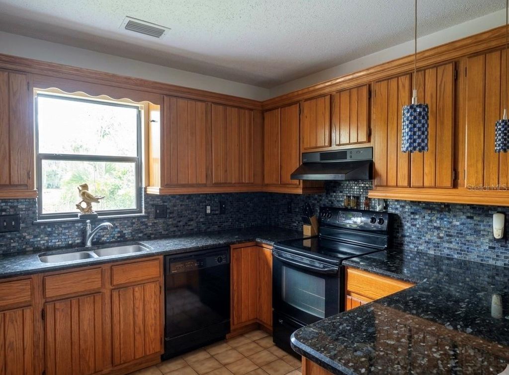 Photo of 2070 S Courtenay Parkway, Merritt Island, FL 32952 (MLS # O6402497)