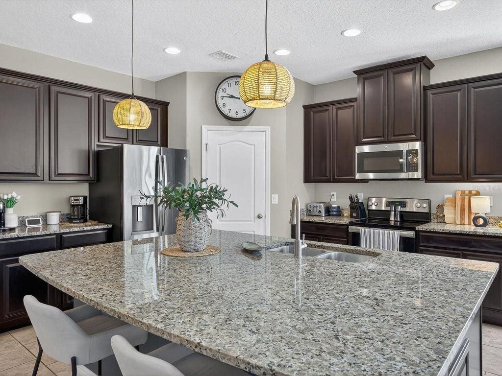 Photo of 120 Whirlaway Drive, Davenport, FL 33837 (MLS # O6344963)