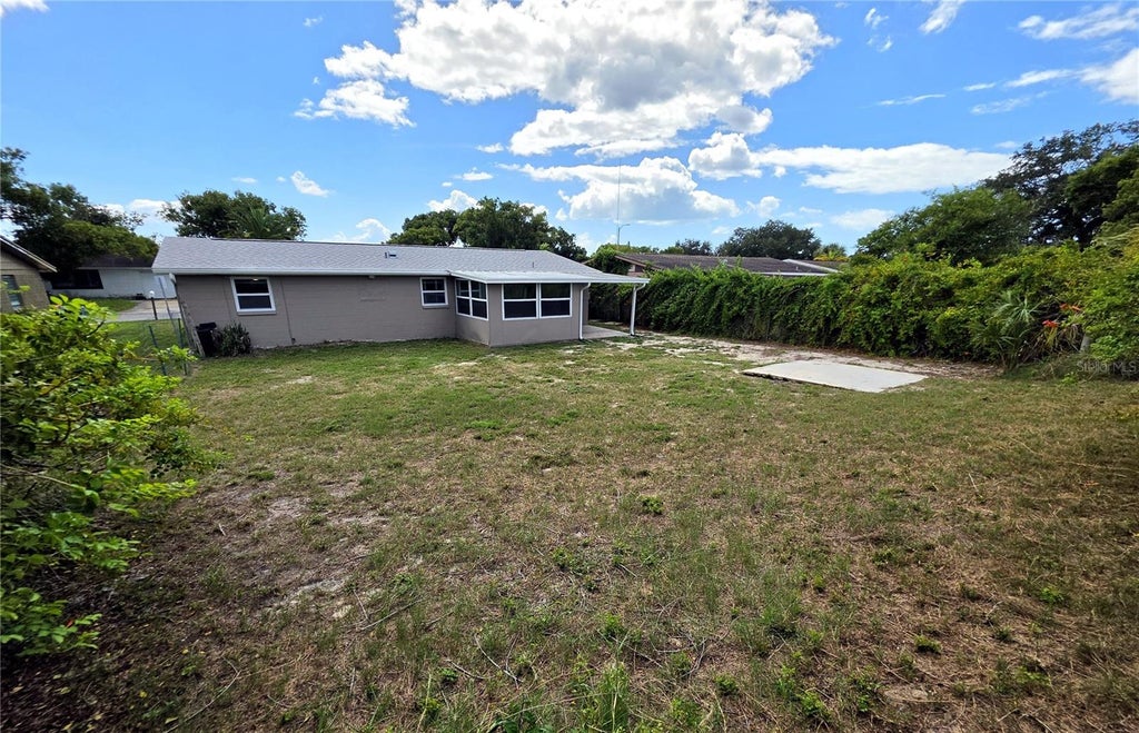 Photo of 3647 Bigelow Drive, Holiday, FL 34691 (MLS # R4912027)