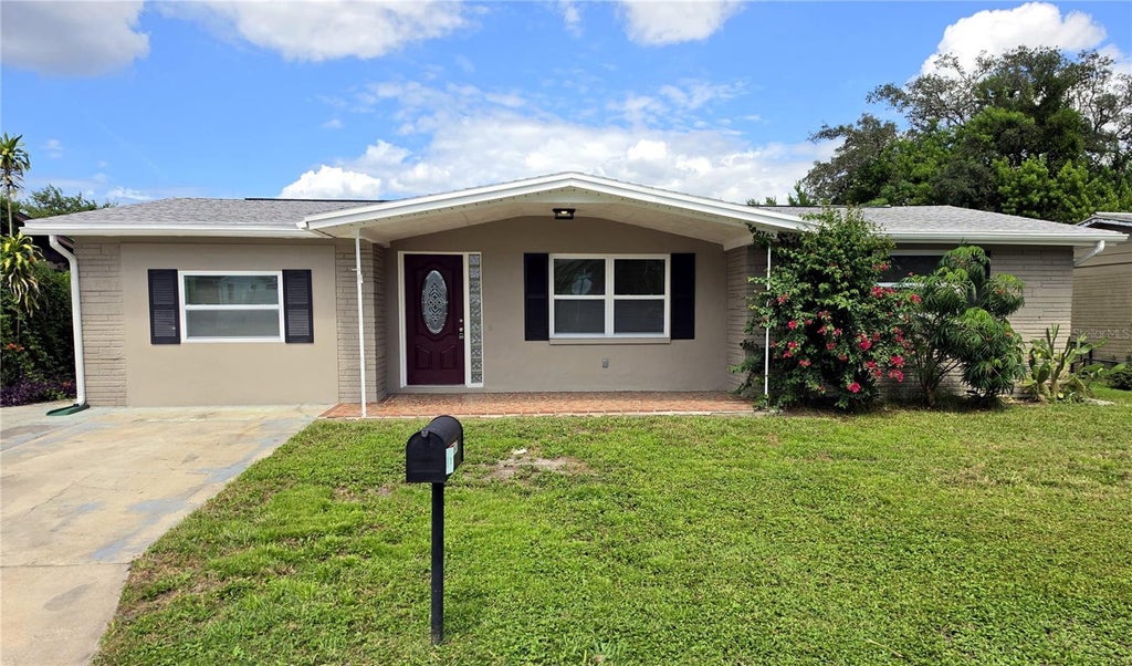 Photo of 3647 Bigelow Drive, Holiday, FL 34691 (MLS # R4912027)