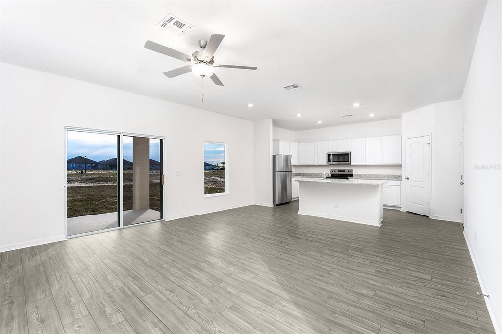 Photo of 3719 Bergamot Street, Lake Alfred, FL 33850 (MLS # TB8403887)