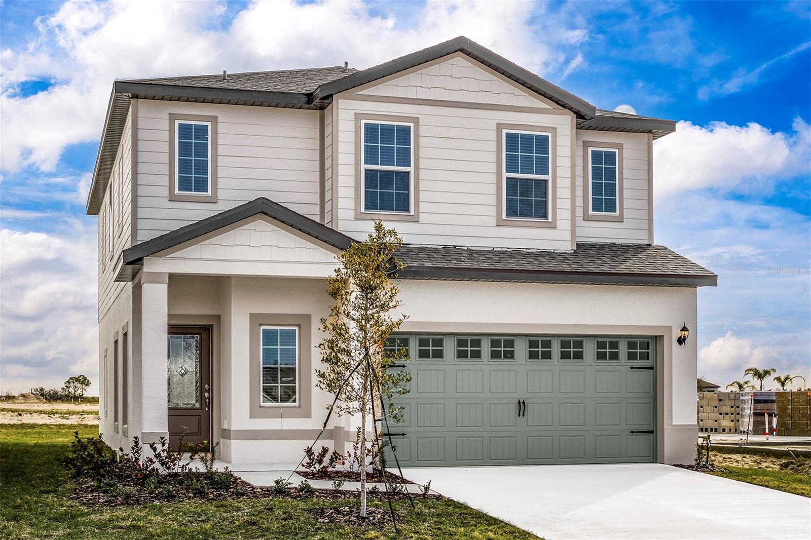 Pre-Construction. To be built. Welcome home to the Mangrove at Gum Lake Preserve, a beautifully crafted two-story home featuring four spacious bedrooms, two-and-a-half baths, and a two-car garage. Designed with growing families in mind, this thoughtfully designed layout includes stylish upgrades throughout and provides both function and comfort. The open-concept first floor is perfect for gathering, with a chef-ready kitchen showcasing an oversized island with a breakfast bar, ample counter space, and a large four-shelf pantry to keep your kitchen essentials in order. The kitchen flows naturally into the dining and living areas, making it easy to host guests or relax at home. A sliding glass door leads to the covered lanai, extending your living space outdoors.
Upstairs, you’ll find all four bedrooms and a versatile loft area that can serve as a playroom, home office, or media room. The luxurious owner’s suite offers a peaceful retreat, with room for a king-sized bed and dresser, a spa-like bathroom with double sinks, a walk-in shower, and a spacious walk-in closet that provides generous storage.
Enjoy charming outdoor spaces, including a long covered front porch and a beautifully landscaped yard. Located in the scenic Gum Lake Preserve, this community offers walking trails, a fishing dock, children’s playground, picnic spots, a boat ramp, and a community gazebo. With easy access to I-4, commuting to Tampa or Orlando is a breeze, and you’re never far from shopping, dining, and entertainment. The Mangrove is a perfect place to call home!
Don't miss out on this incredible home in a community full of amenities! Schedule your tour today
