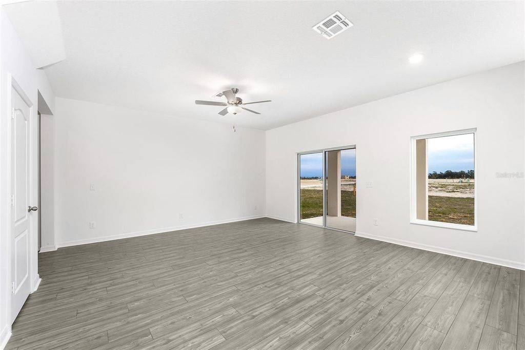 Photo of 3719 Bergamot Street, Lake Alfred, FL 33850 (MLS # TB8403887)