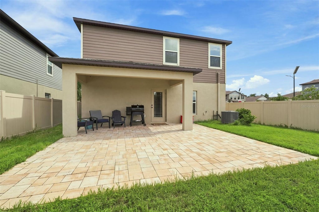 Photo of 22359 Storybook Cabin Way, Land O Lakes, FL 34637 (MLS # W7889293)