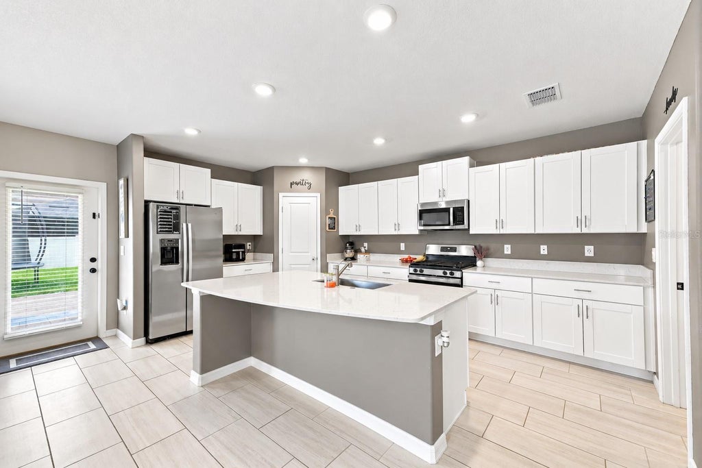 Photo of 22359 Storybook Cabin Way, Land O Lakes, FL 34637 (MLS # W7889293)