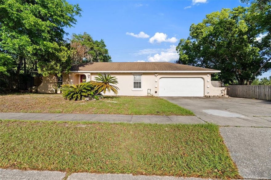 Discover the possibilities at 147 Sandalwood Way with a unique opportunity to own a 3-bedroom, 2-bath home plus a garage efficiency, all with NO HOA. **This house qualifies for a REDUCED RATE through the seller’s preferred lender. This is a lender-paid rate buydown to help reduce your monthly payment and/or closing costs.** Situated on a fully fenced 1/4-acre lot, this property is priced with its future potential in mind and is ready for your personal vision to truly make it shine. Inside, the home offers a split floor plan with cozy, functional living spaces. The family room flows directly into the kitchen, where you’ll find granite countertops, a small island, and ample cabinet space. The dining area was converted from the original porch, and an additional enclosed porch was added to create extra living space and flexibility. A portion of the garage has been converted into an efficiency with it's own entry access, giving you space to use as an additional room, office, or income potential. It includes a bathroom with a shower stall and a small kitchenette, all under central air. While it is not counted in heated square footage, it brings the total usable space to just under 2,000 square feet. If you’d prefer a traditional garage, the space can very easily be converted back. Major systems have already been addressed, with the roof and HVAC updated in 2013, and the plumbing and electrical systems up to code. A pre-inspection has been completed, and the home is expected to pass a 4-point inspection, adding peace of mind. Step outside to an oversized lot with no rear neighbors, backing up to a serene conservation area for added privacy. Located adjacent to Sandalwood Park, with a playground and basketball courts, you’ll enjoy easy access to recreation while still having a quiet, low-traffic setting. Built with durable concrete block construction and located in a highly rated Seminole County school district, this property offers solid bones in a prime location. Enjoy quick access to shopping, dining, and major highways, all while living in a neighborhood known for its charm and convenience. Bring your vision and cosmetic updates to make this home your own!